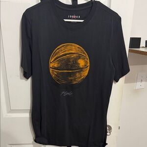 Jordan Men's Black Tee with Orange Graphic